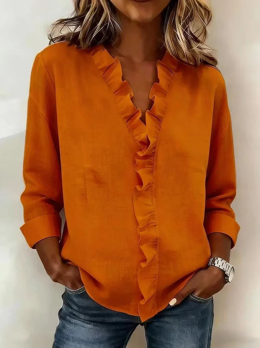 Carmen – Blusa elegante con escote en V y volantes suaves