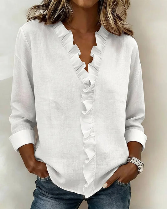 Carmen – Blusa elegante con escote en V y volantes suaves