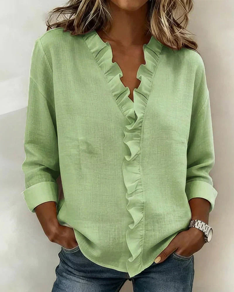 Carmen – Blusa elegante con escote en V y volantes suaves