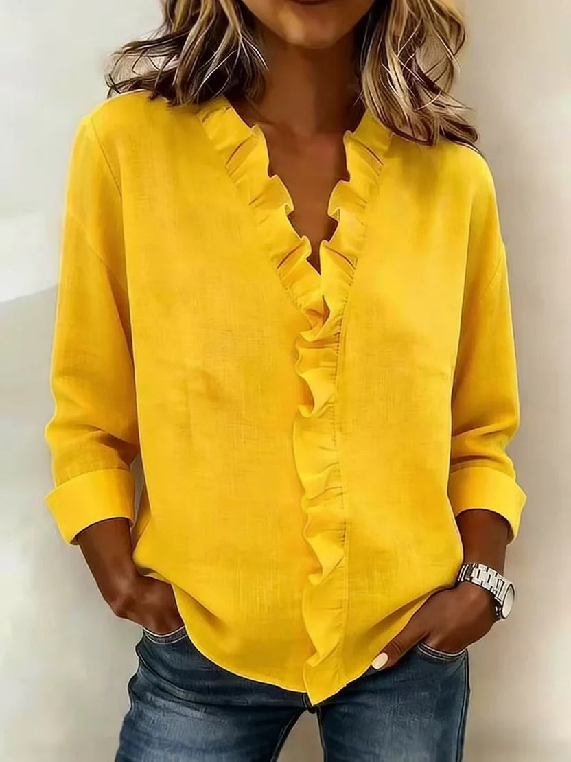 Carmen – Blusa elegante con escote en V y volantes suaves