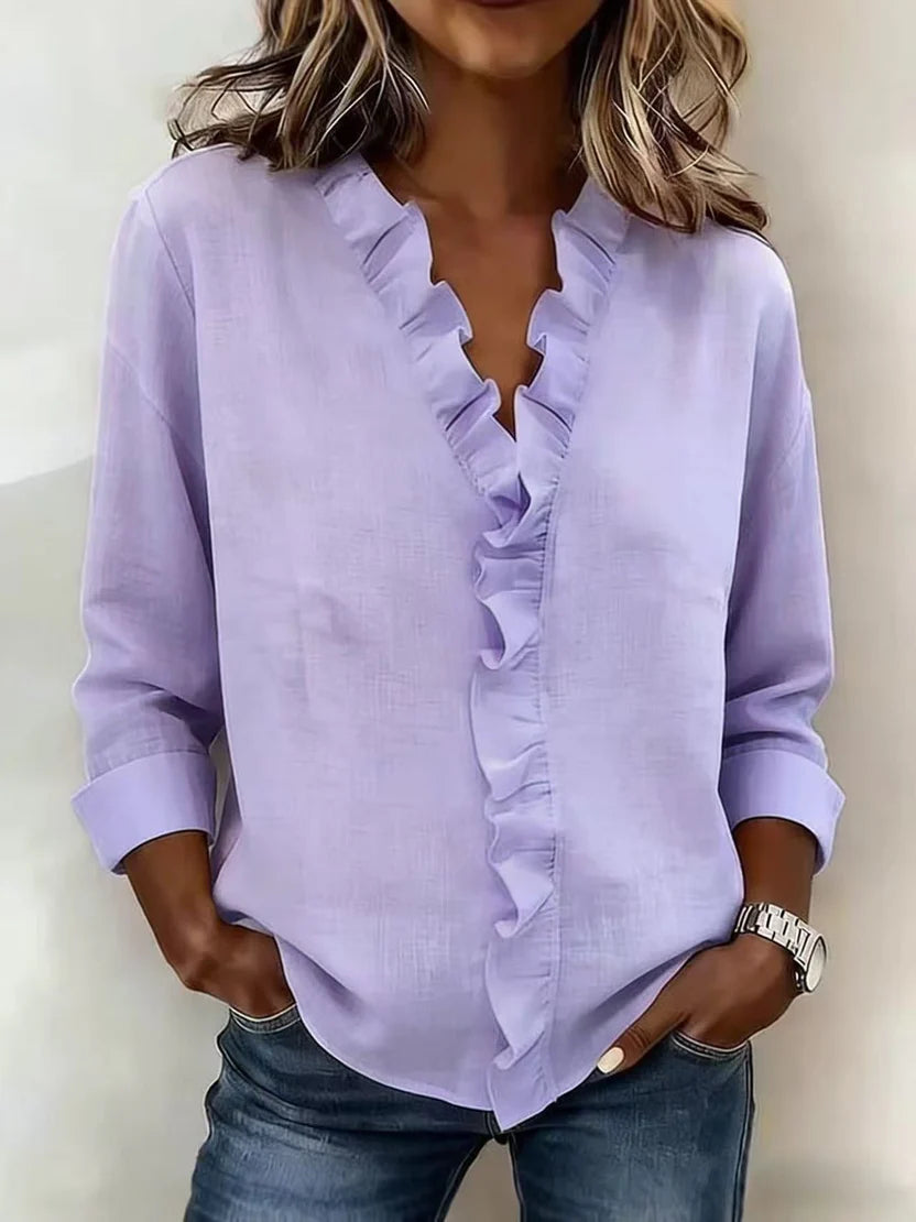 Carmen – Blusa elegante con escote en V y volantes suaves